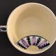 Pair of ceramic cups including a mustache cup for gentleman