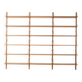 Classic wall shelf by Poul Cadovius for Cado, 1950s, teak veneer, 18 shelves, 4 ladders, Denmark