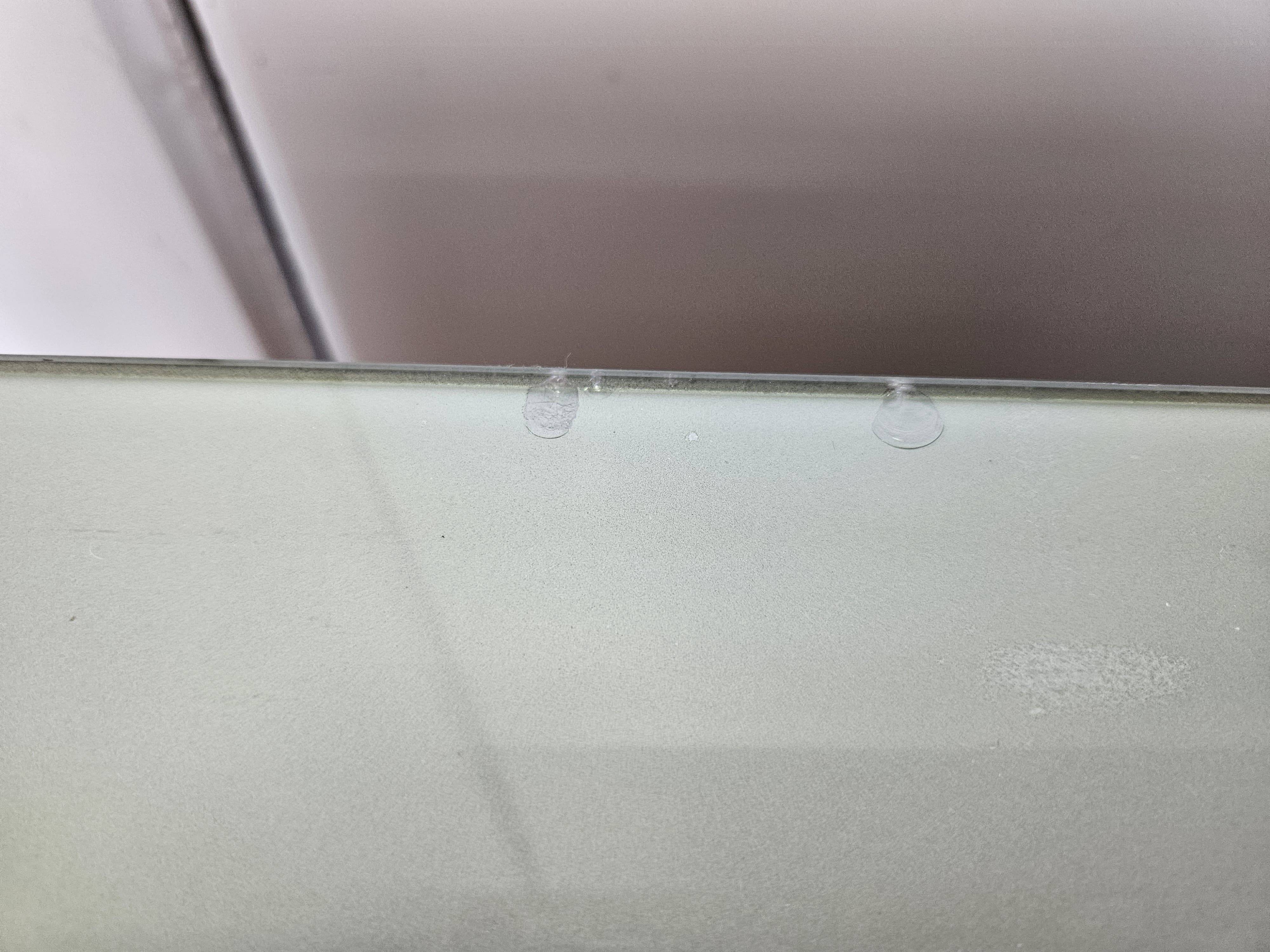 1960s chest of drawers in mahogany and lacquered mahogany with blue glass