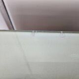 1960s chest of drawers in mahogany and lacquered mahogany with blue glass