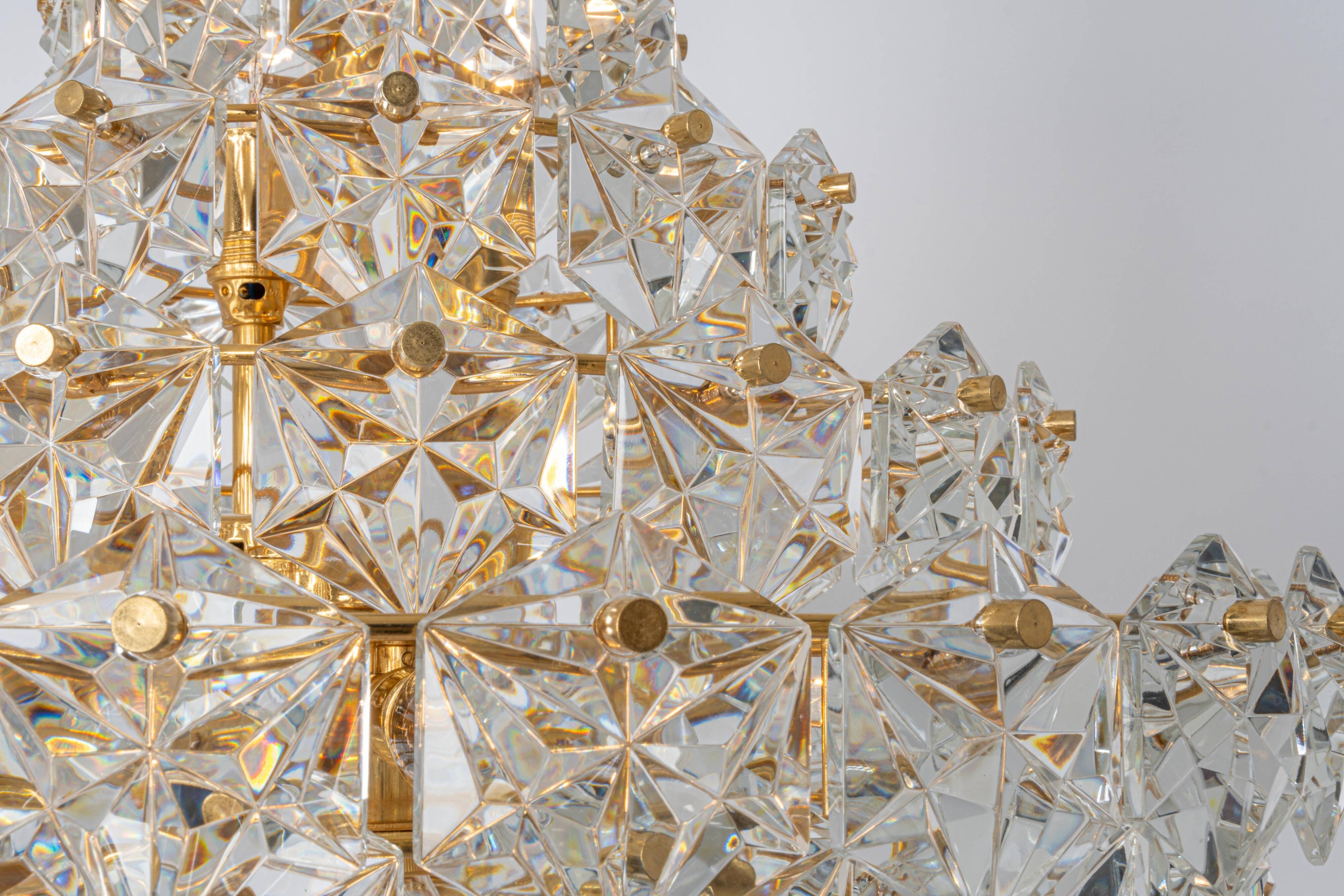 Chandelier, brass and crystal glass by Kinkeldey, Germany, 1970s.