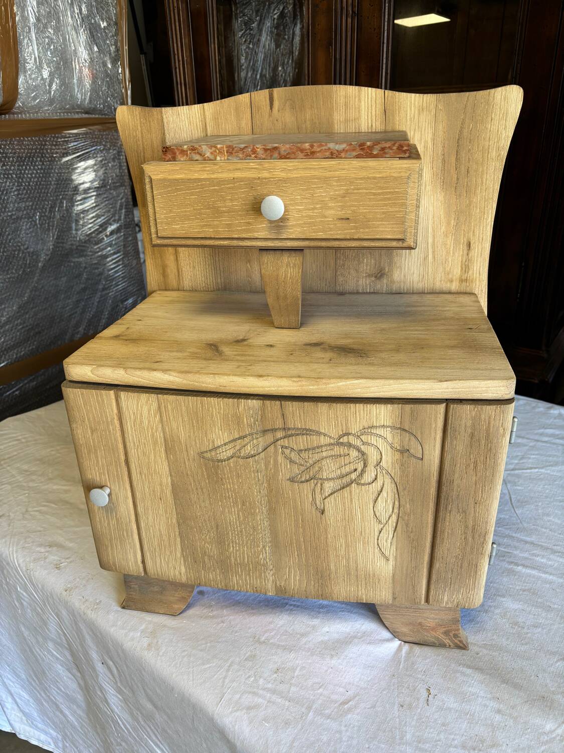 Raw wood bedside table