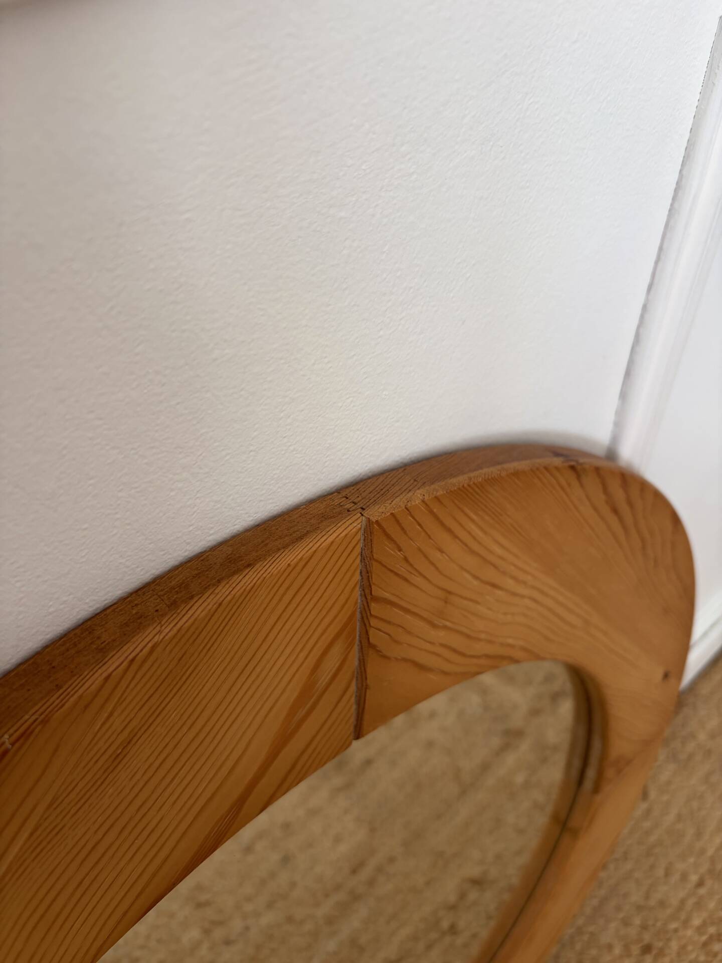 Round Scandinavian pine mirror from the 1970s.