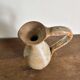 Handcrafted stoneware vase, a vintage piece from the 1960s.