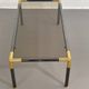 Gunmetal gold metal and smoked glass coffee table from the 70s