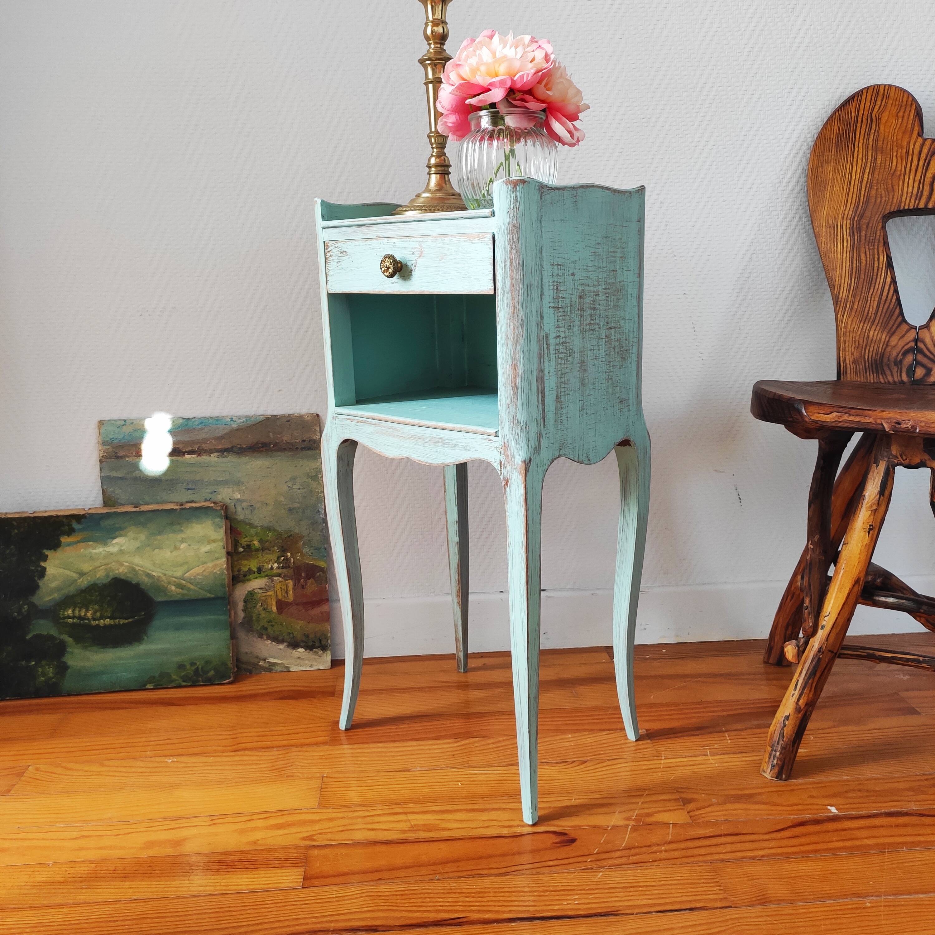Patinated bedside table end of sofa