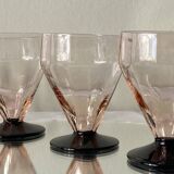 6 small Art Deco pink wine or water glasses with black stems.