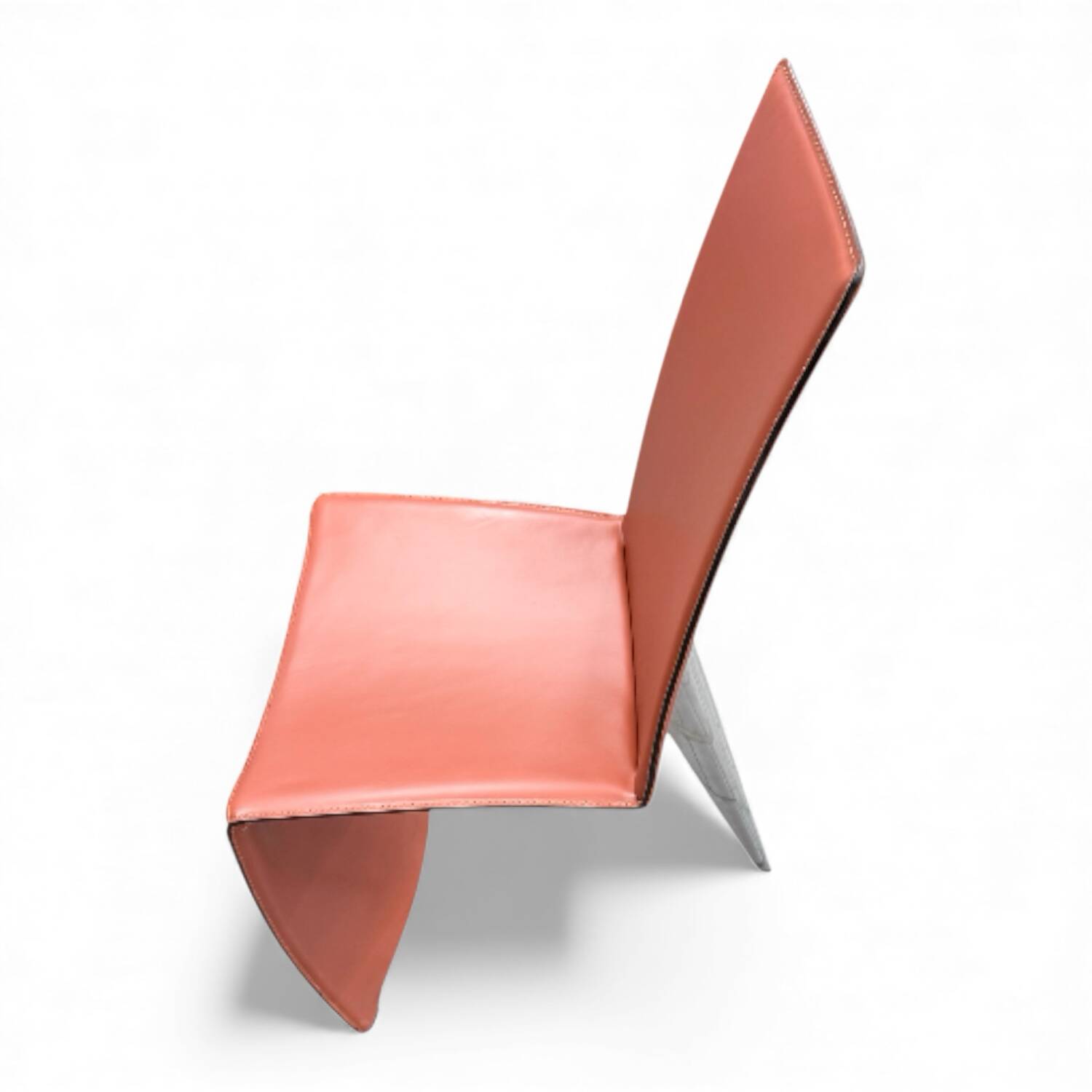 Red leather armchair in modern Italian style, signed Philippe Starck, 1980s.