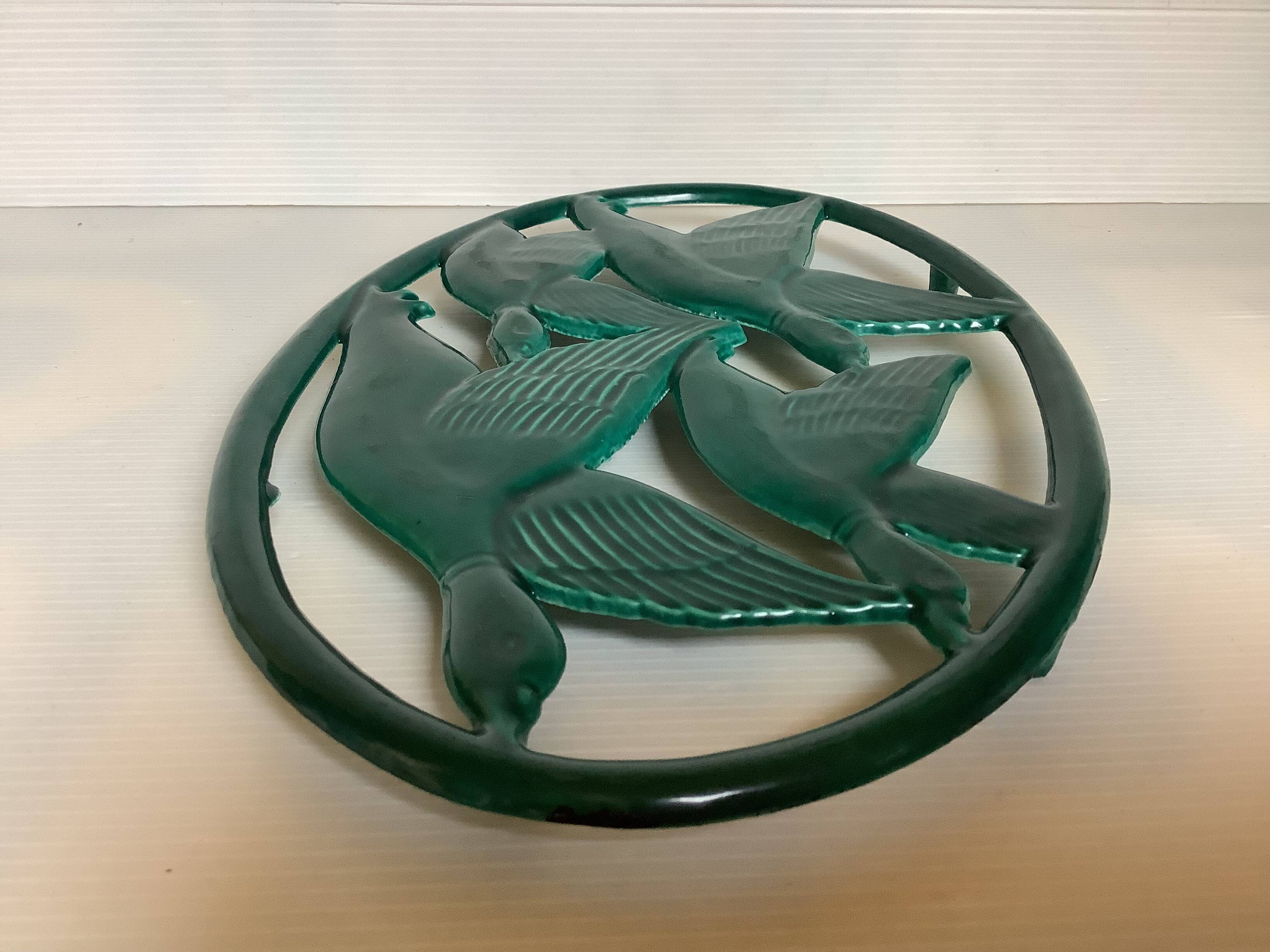 Zoomorphic enameled cast iron trivet