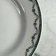 Set of 12 flat plates in Saint Amand earthenware, 22.5cm.