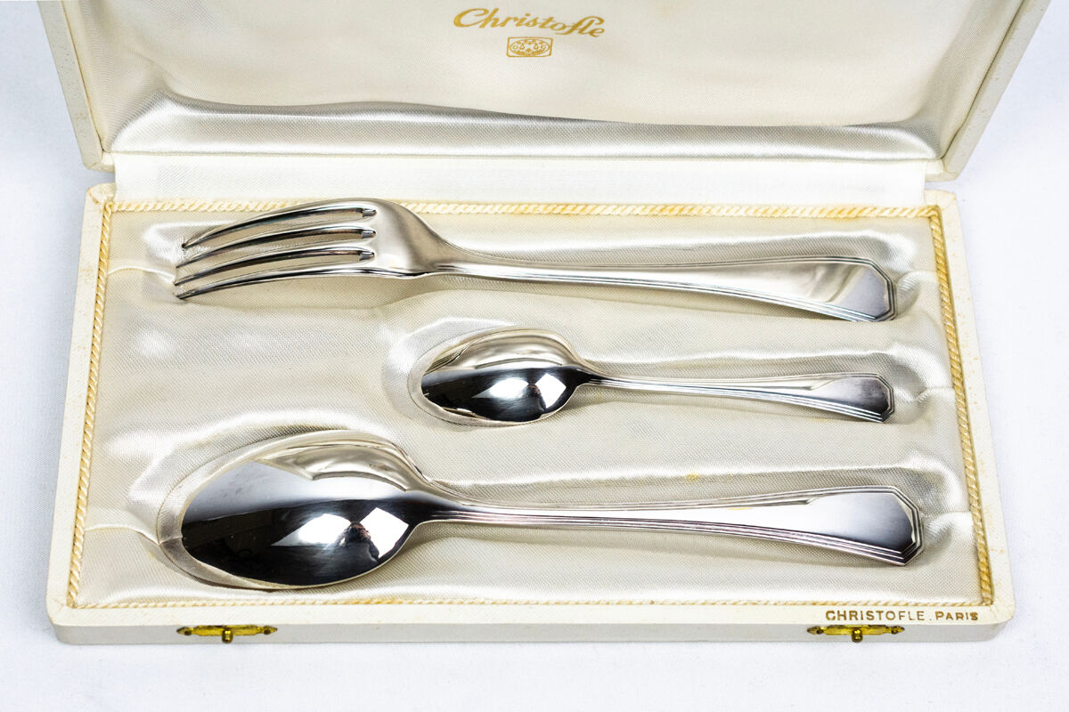 Three-piece birth set "America" — Christofle. 20th century.