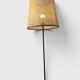 Modernist tripod floor lamp in black metal and cane from the 1950s/1960s.