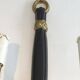 Pair of Black Lacquered Bronze Wall Lights with Lion Head Decorations
