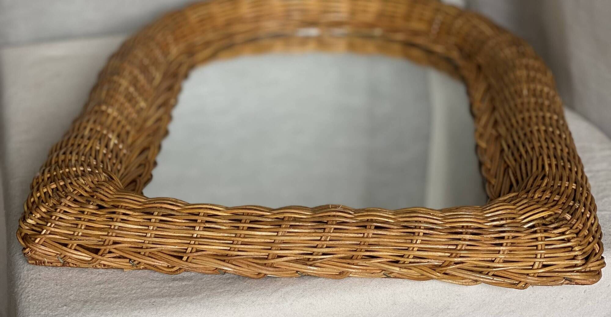 Vintage 1970 woven rattan mirror