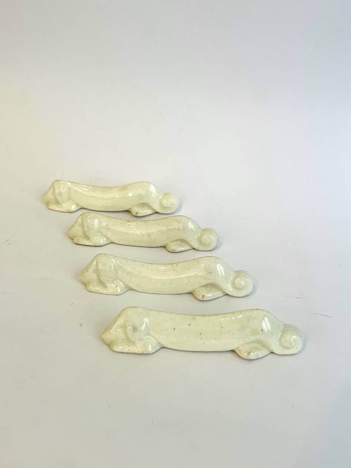 Set of 4 Art Deco knife rests, Primavera workshop