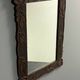 Arts & Crafts hand-carved wall mirror with floral roses, early 20th century