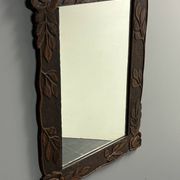Arts & Crafts hand-carved wall mirror with floral roses, early 20th century