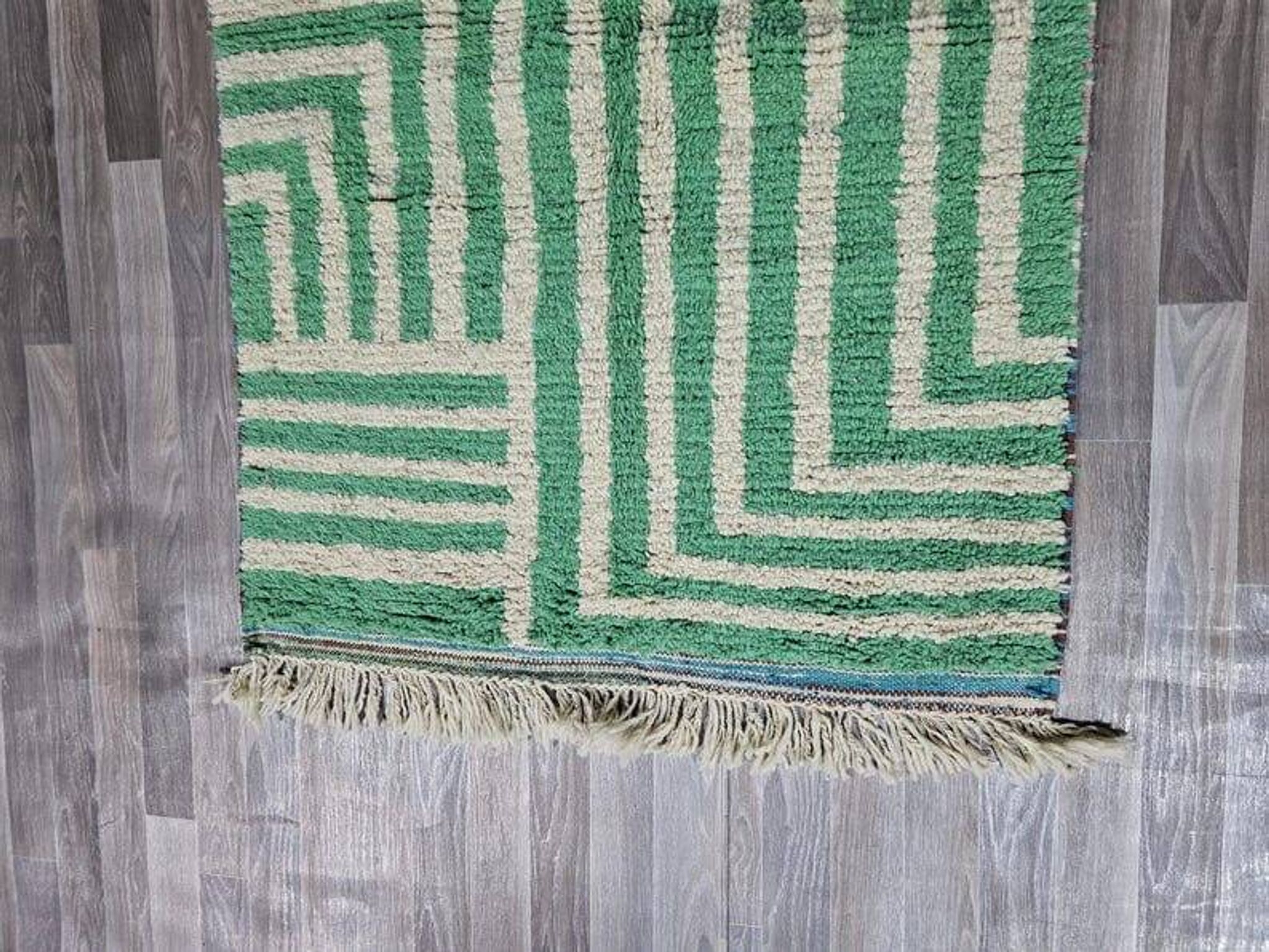 Handmade natural wool rug, size 140 x 260 cm.