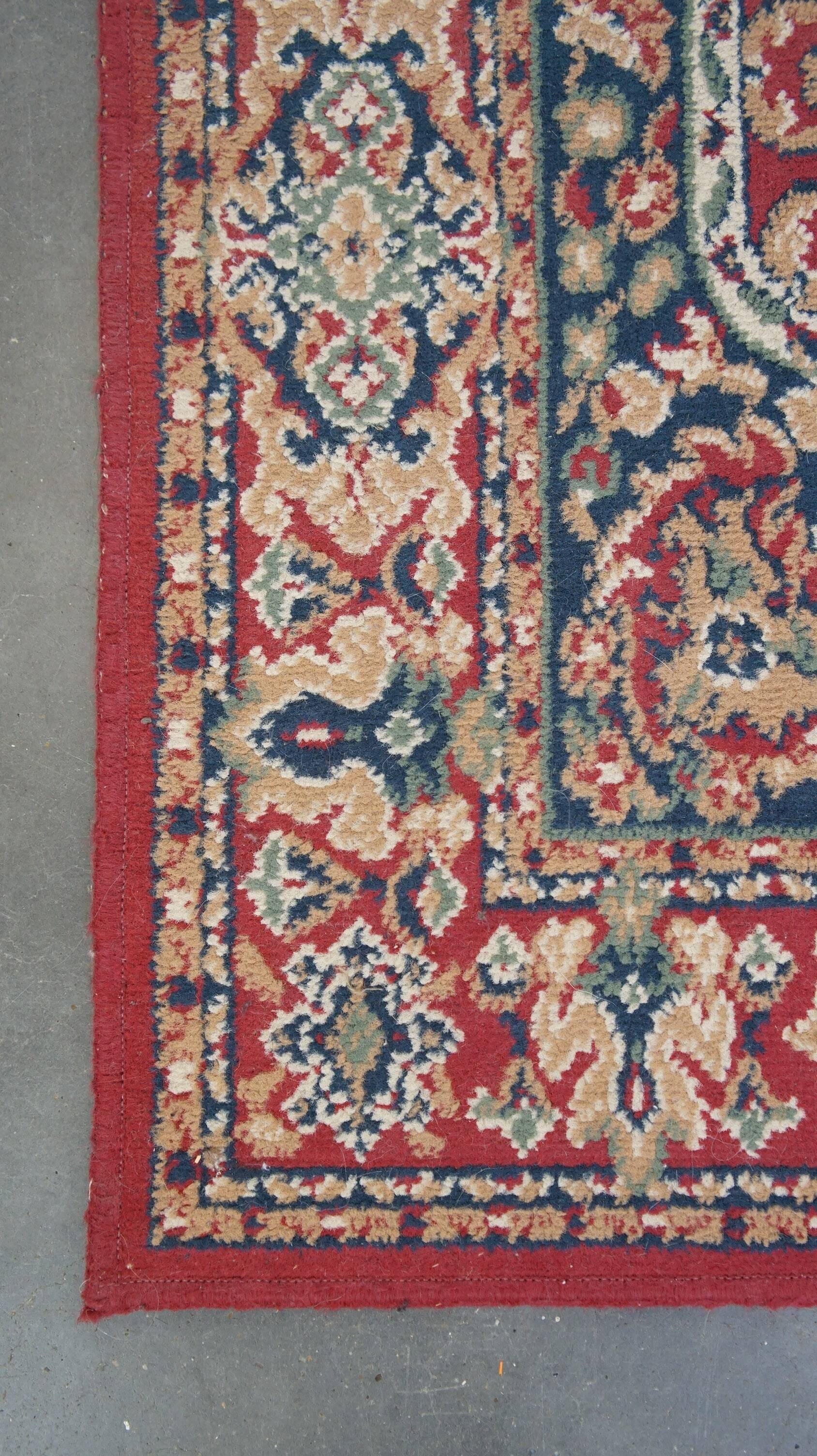 Vintage oriental rug with predominantly red, cream, and beige colors, measuring 168x120 cm