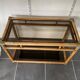 Vintage 1950s rattan and glass TV storage unit.