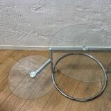 Glass coffee table with 2 swivel tops