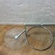 Glass coffee table with 2 swivel tops