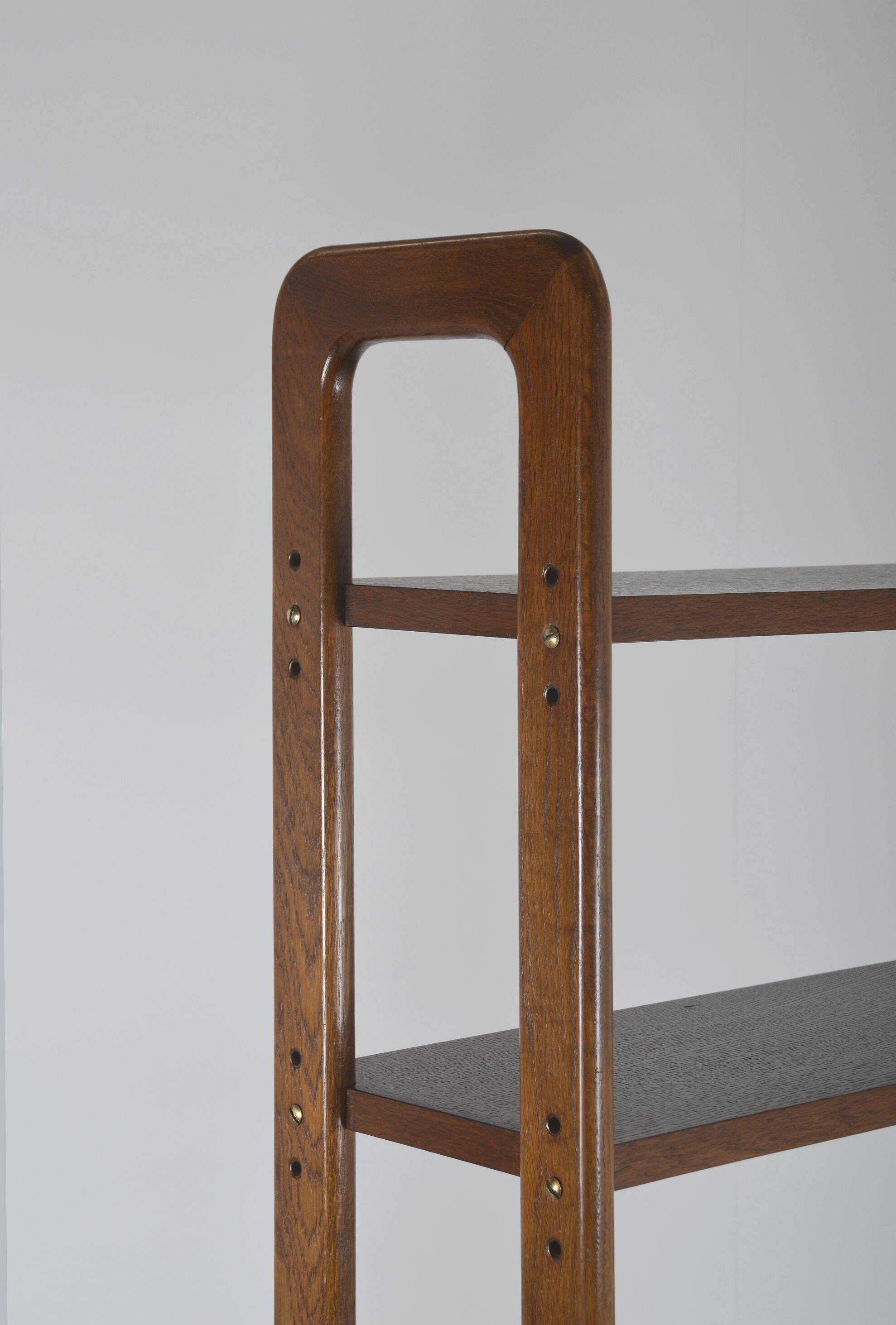 Danish freestanding wall rack with brass accents, 1960s