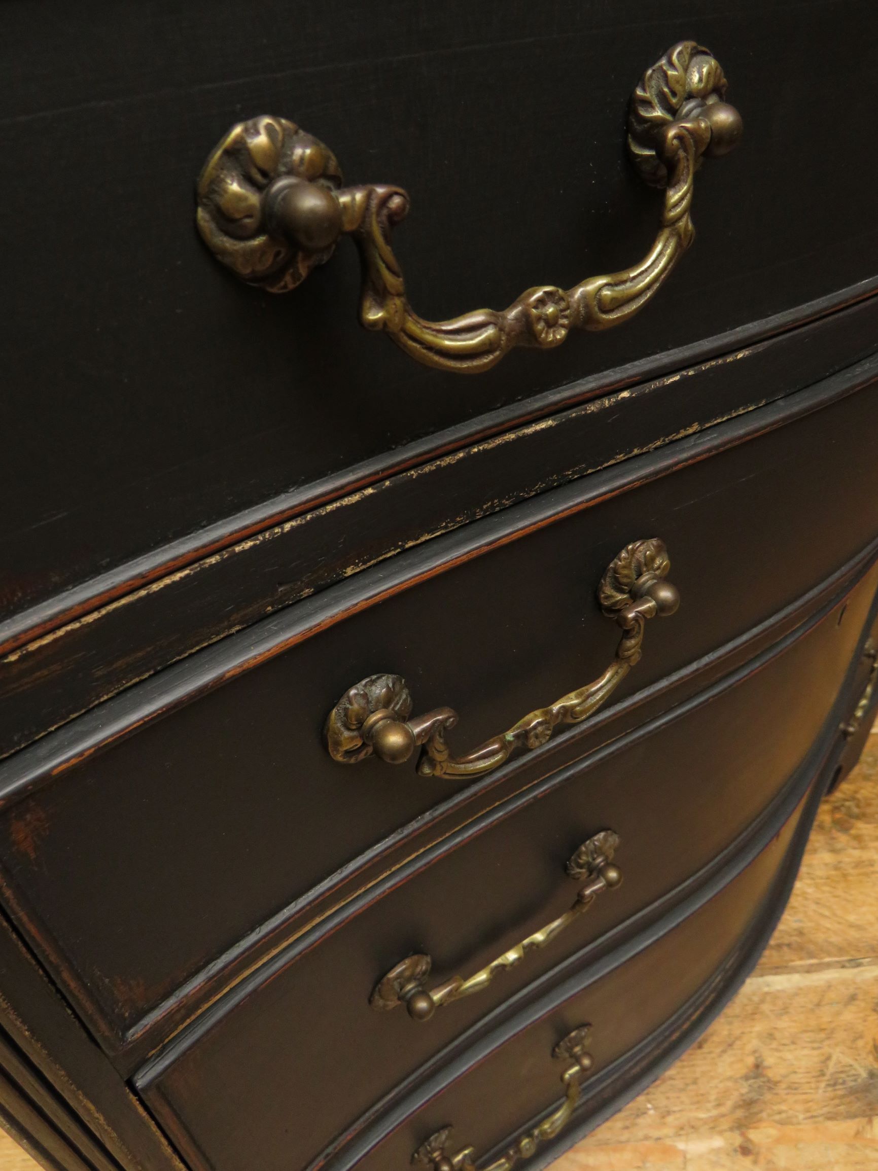 Antique black painted serpentine bachelors chest of drawers