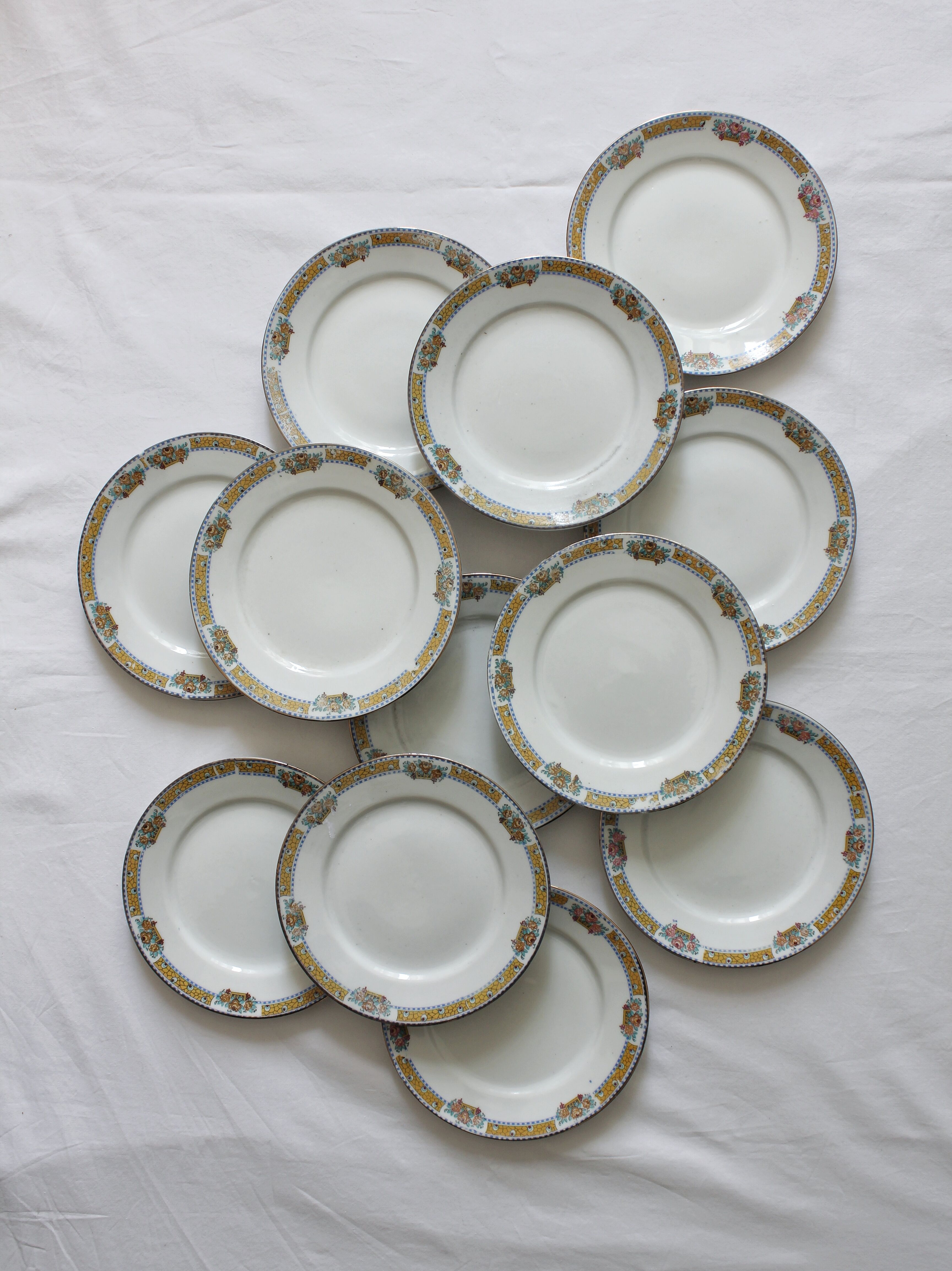 12 vintage porcelain dessert plates