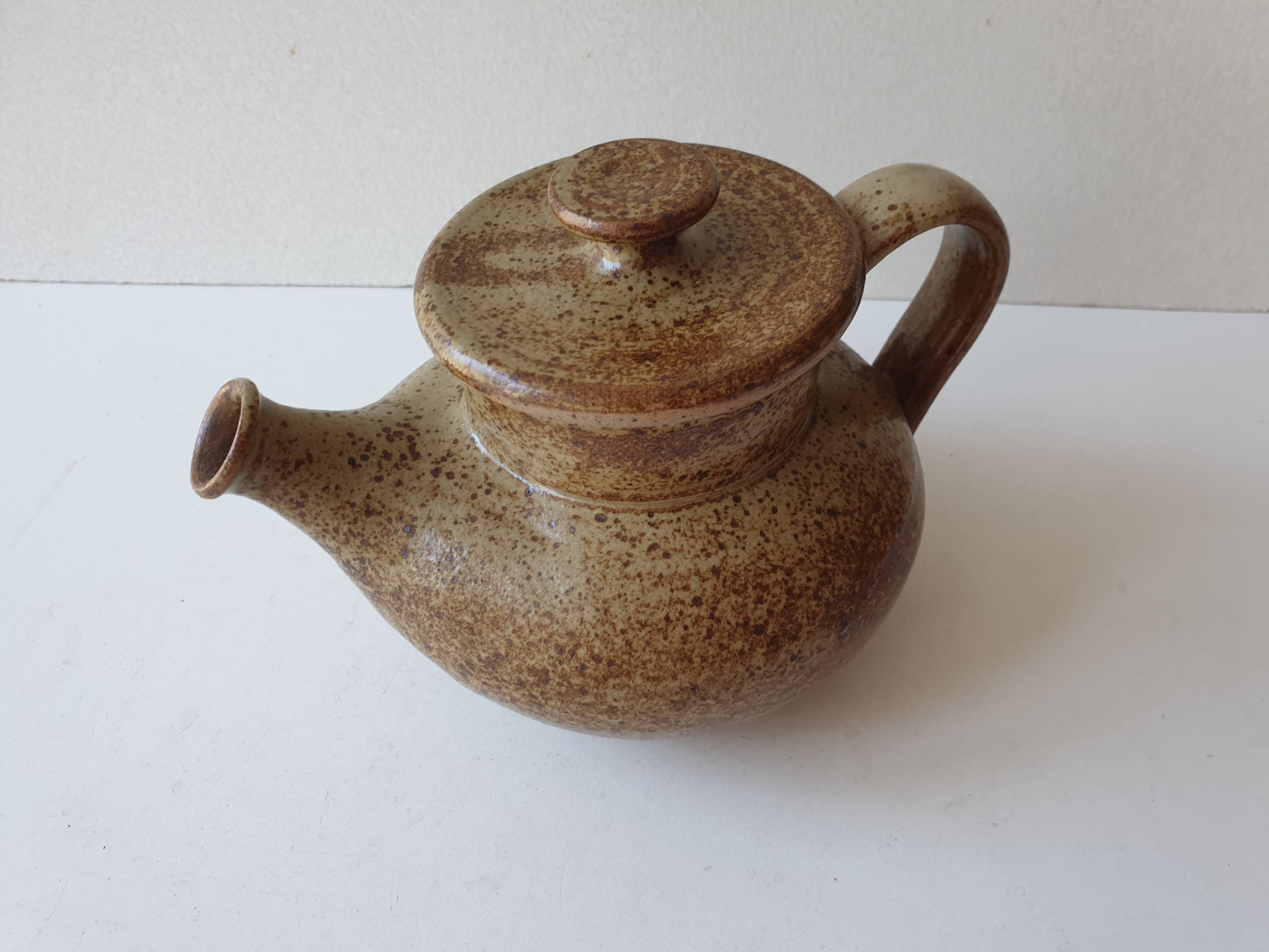 Small teapot in pyrite stoneware ceramic signed NC (Signature to be identified)