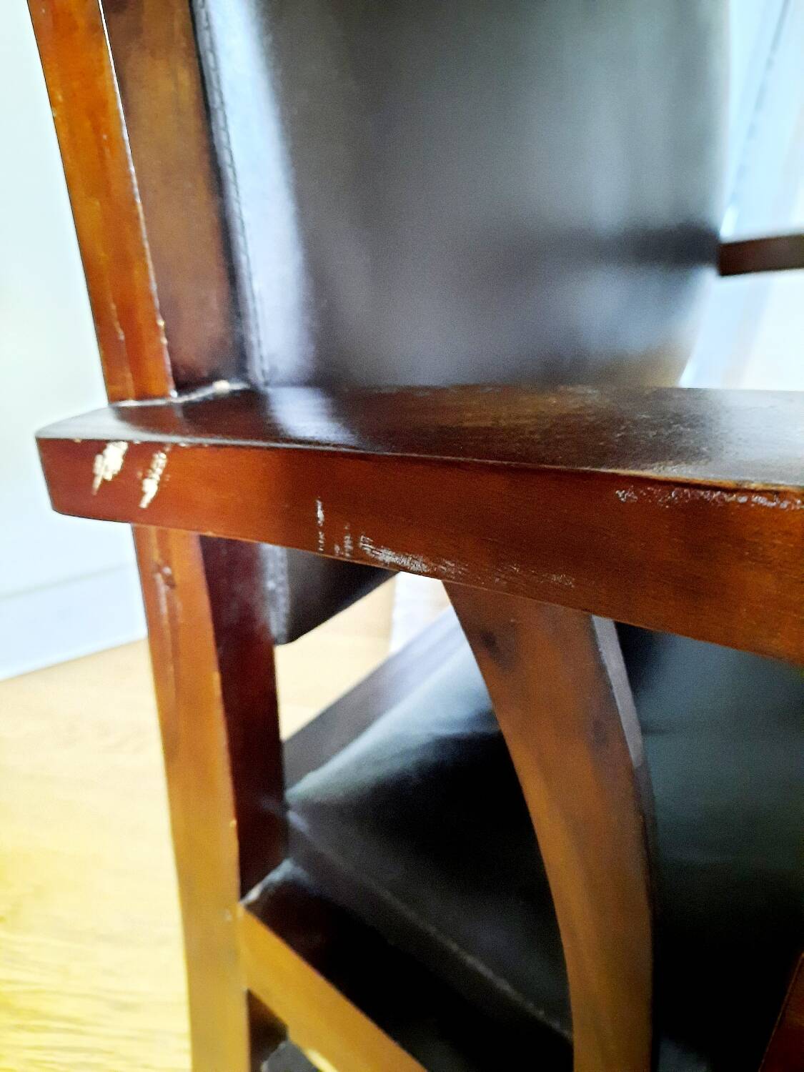 Colonial style wooden armchair