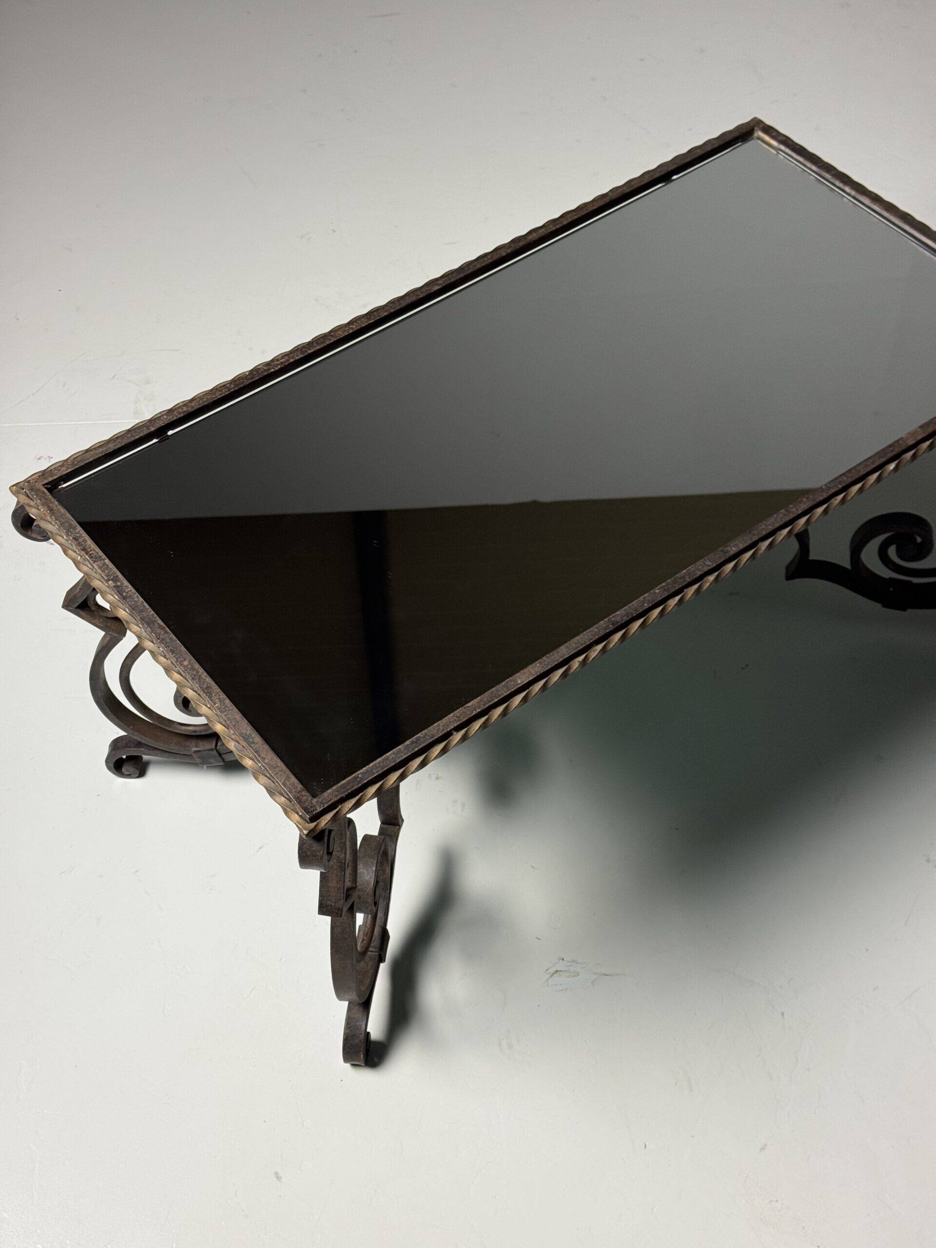 Wrought iron coffee table with mirror glass