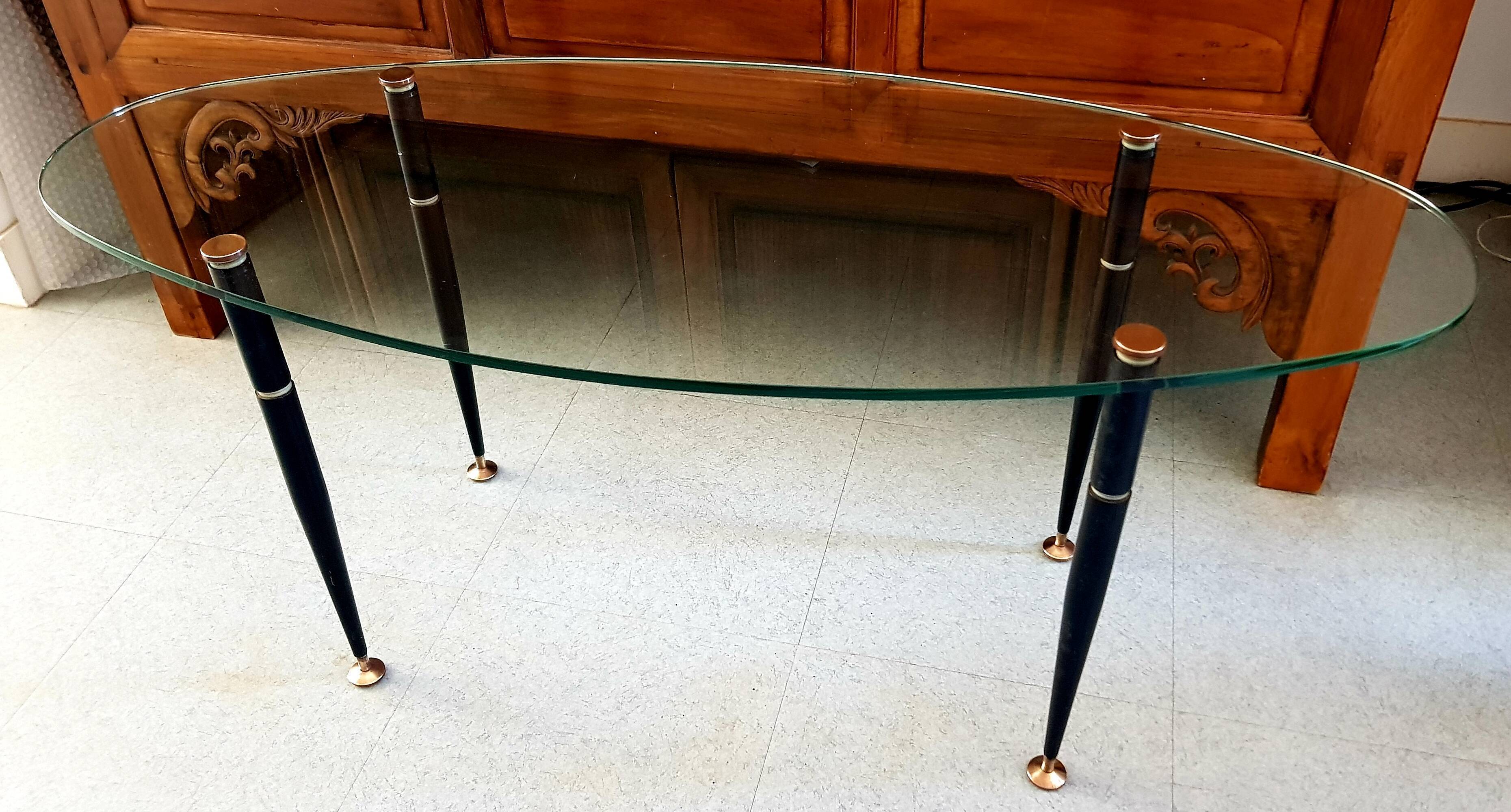 1950 oval coffee table in steel and brass glass