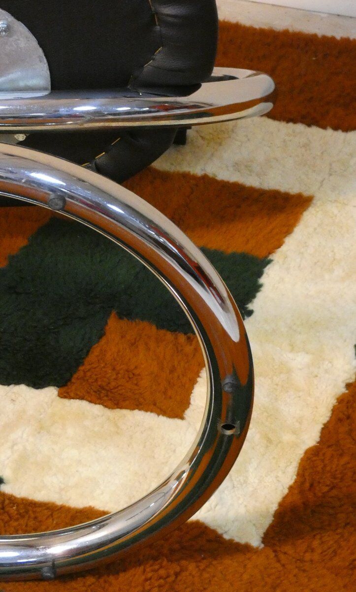Cobra chairs in steel and black leather by Giotto Stoppino, 1970s, set of 5.