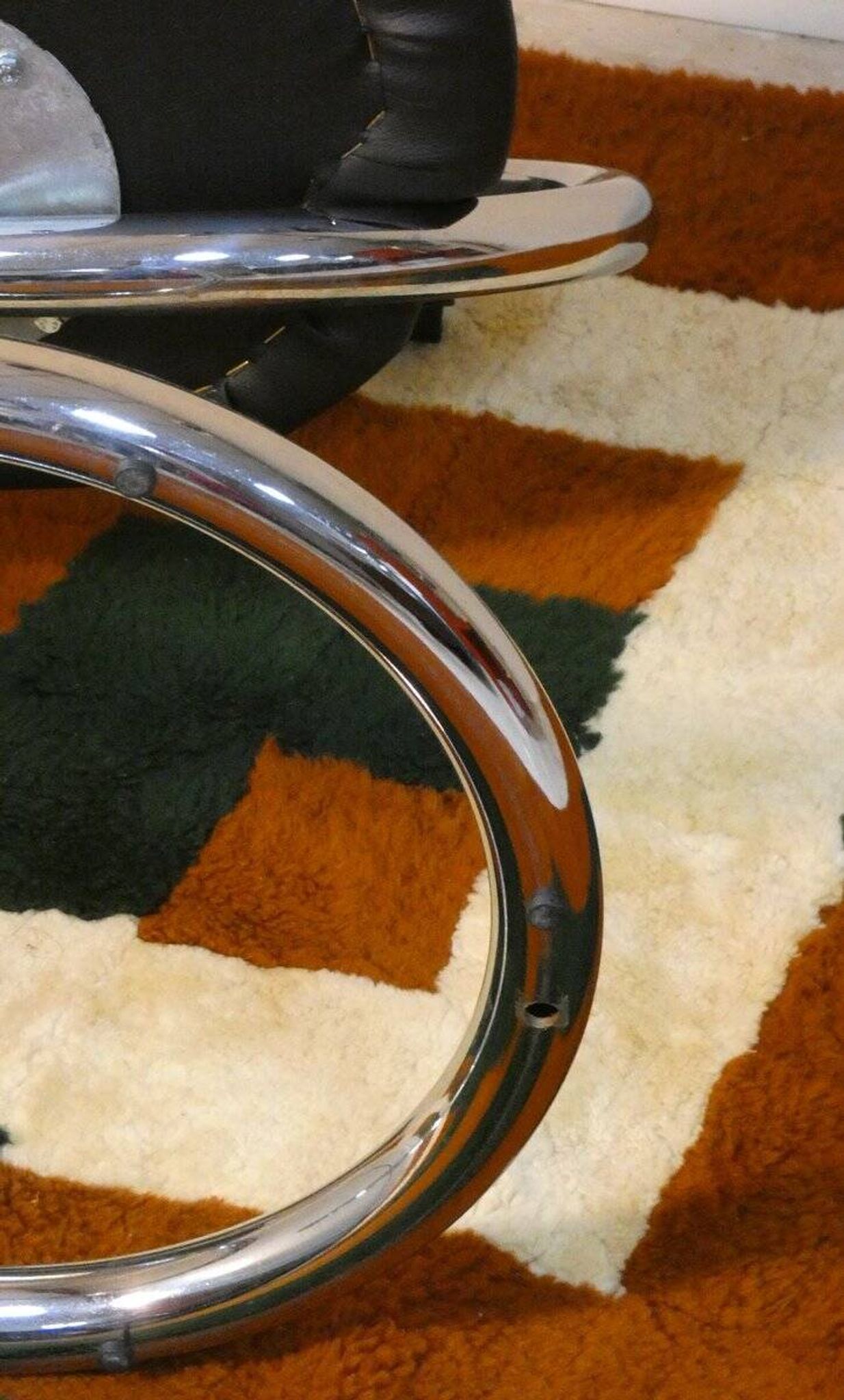 Cobra chairs in steel and black leather by Giotto Stoppino, 1970s, set of 5.