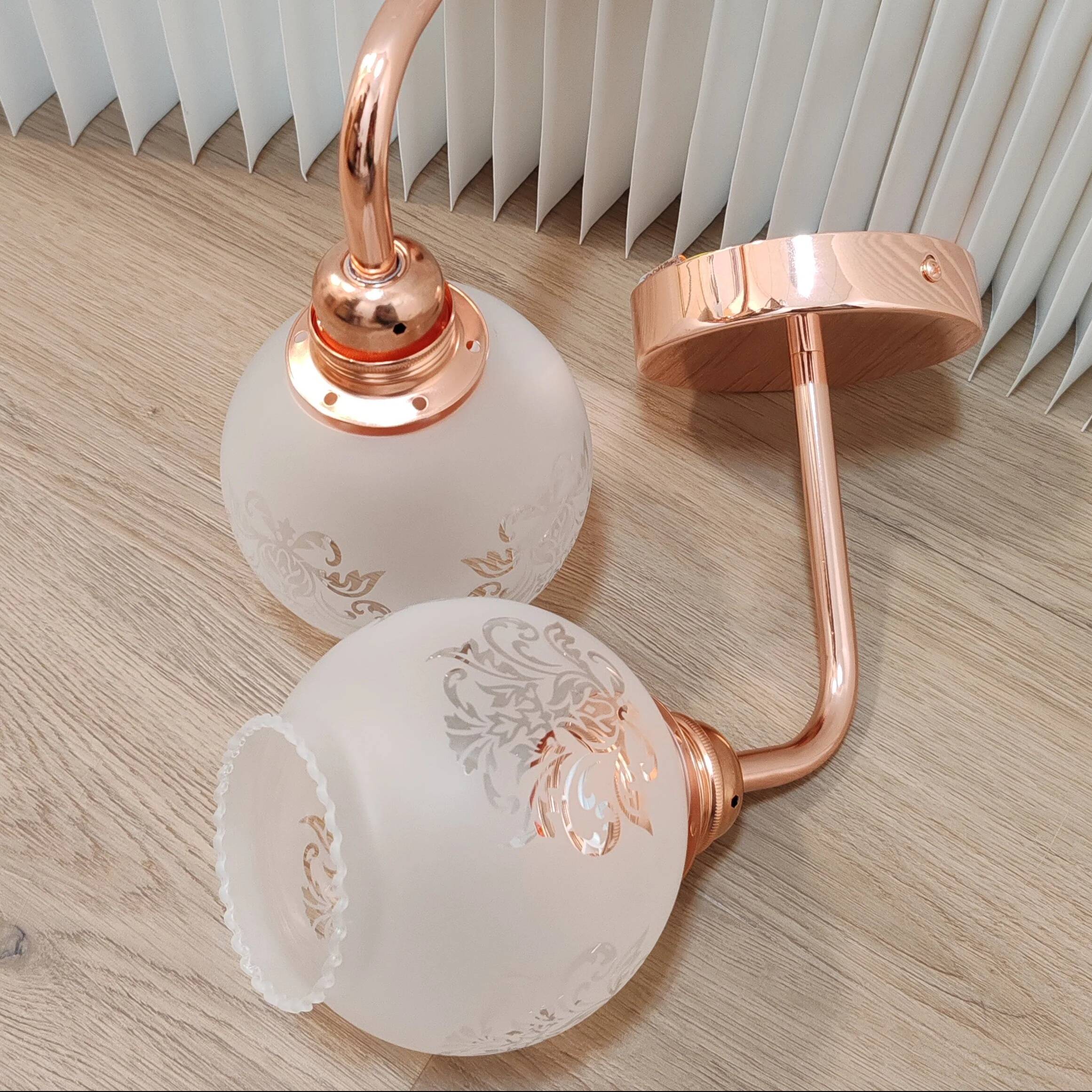 Pair of white ball wall lights