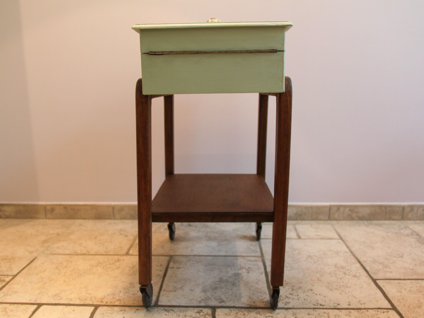 Worker green wood feet wheels