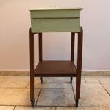 Worker green wood feet wheels