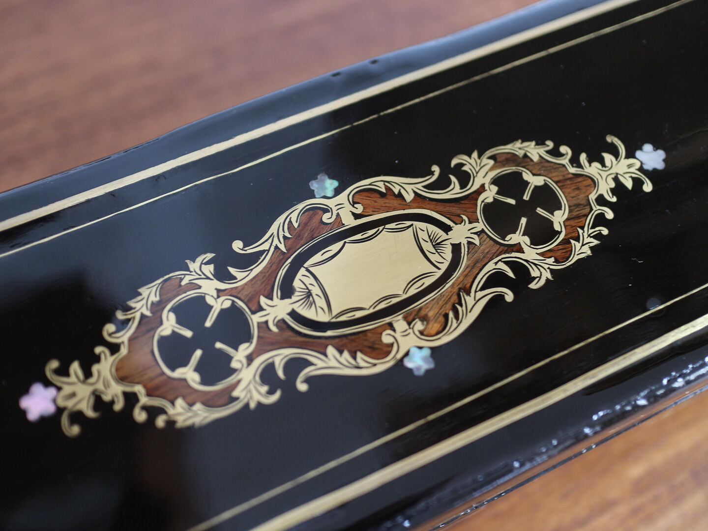 Glove box in ball marquetry