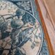 Antique trivet in Gien tile with blue bird decoration – wooden border