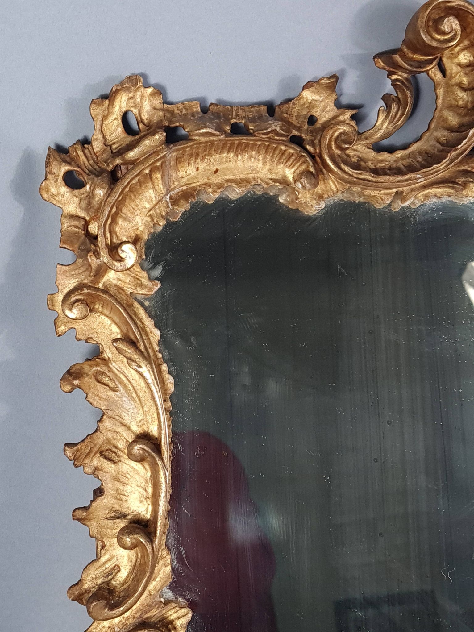 Mirror circa 1800, carved and gilded wooden frame, rocaille decoration, 54x39 cm, C227