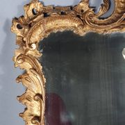 Mirror circa 1800, carved and gilded wooden frame, rocaille decoration, 54x39 cm, C227