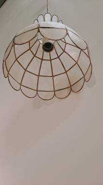 Mother-of-pearl and brass suspension