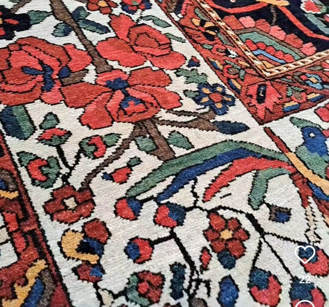 Ancient Persian carpet made of hand-woven wool. Very good condition.
