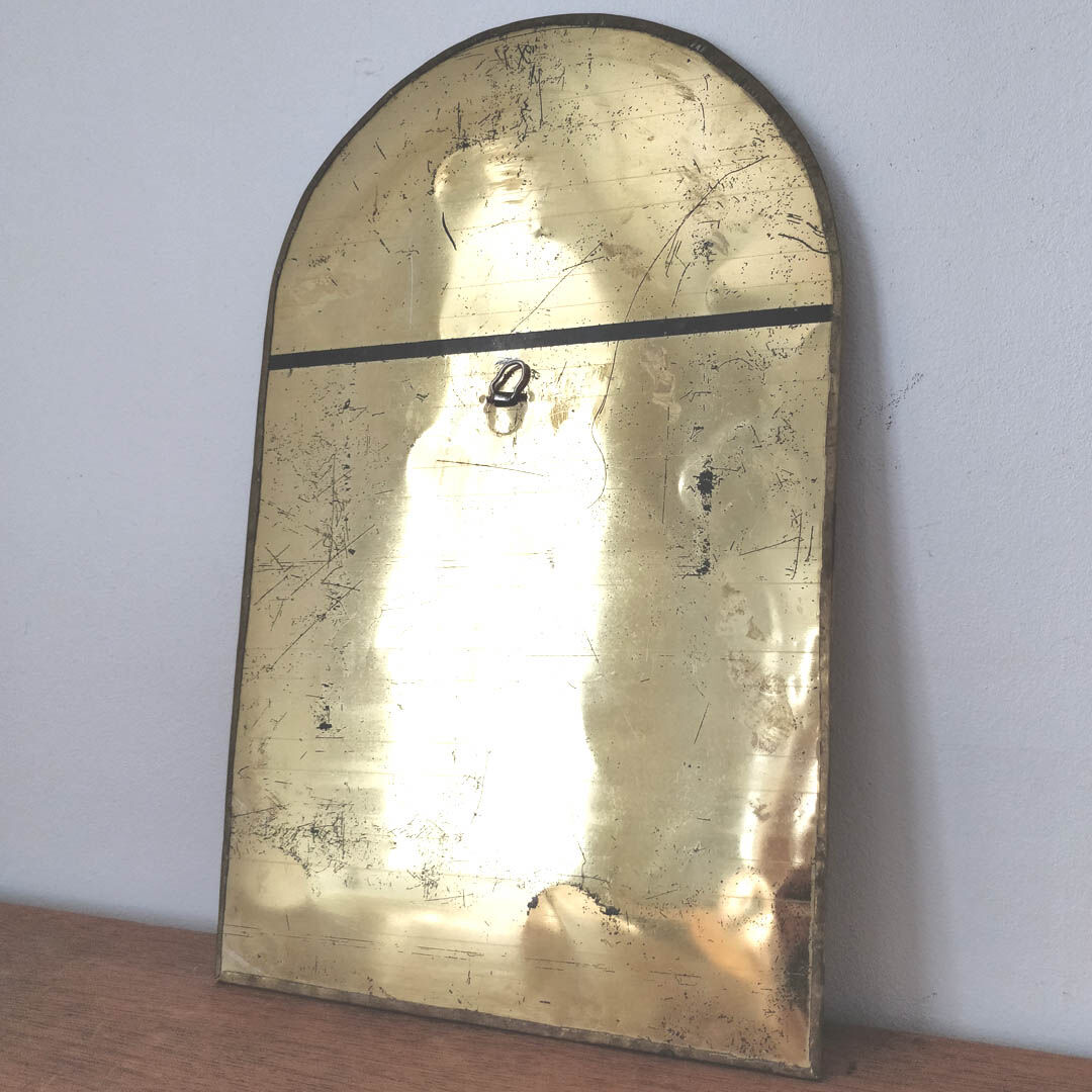 Half-moon brass mirror stitched ice