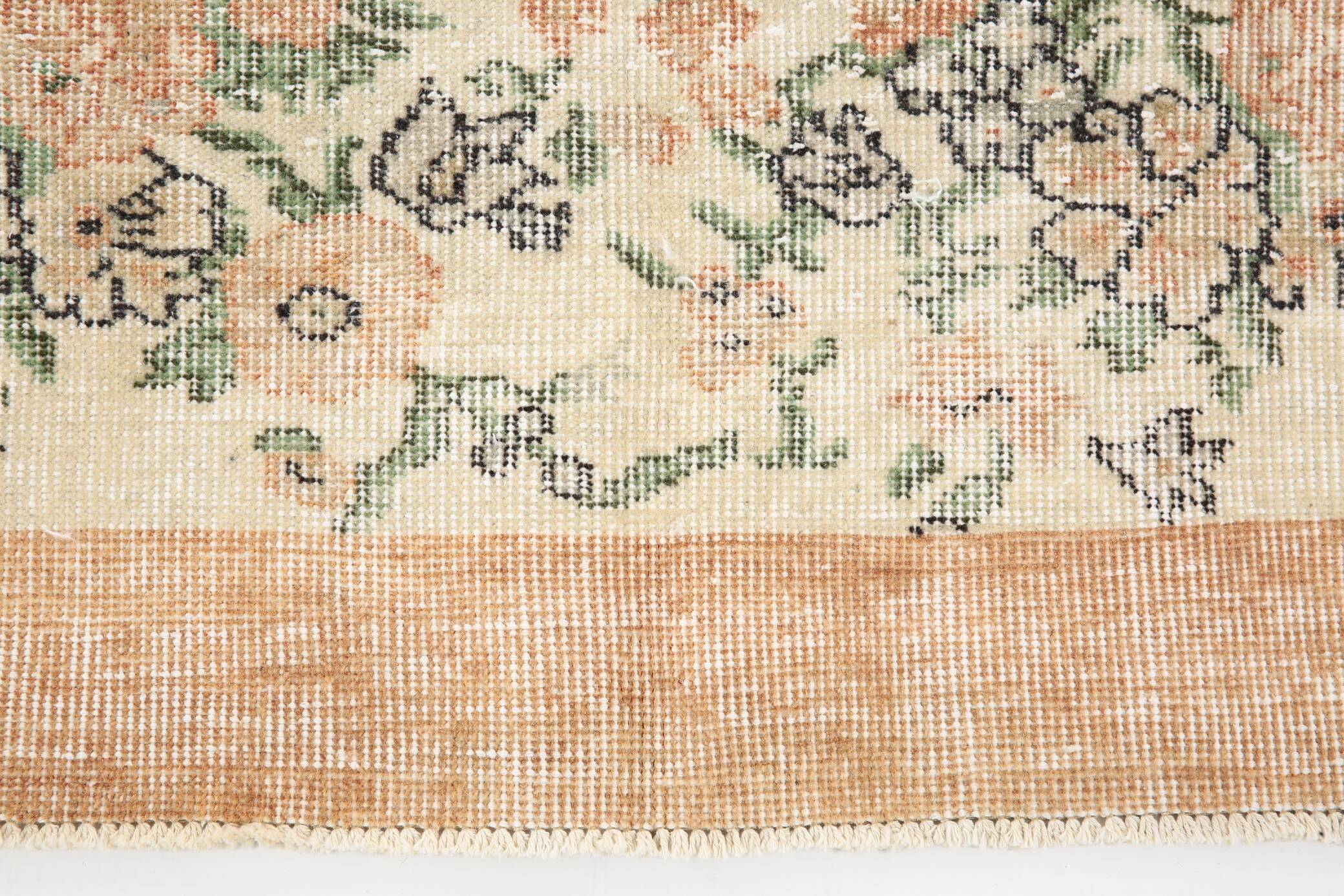 Tapis en laine et coton à décor floral