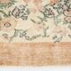 Tapis en laine et coton à décor floral