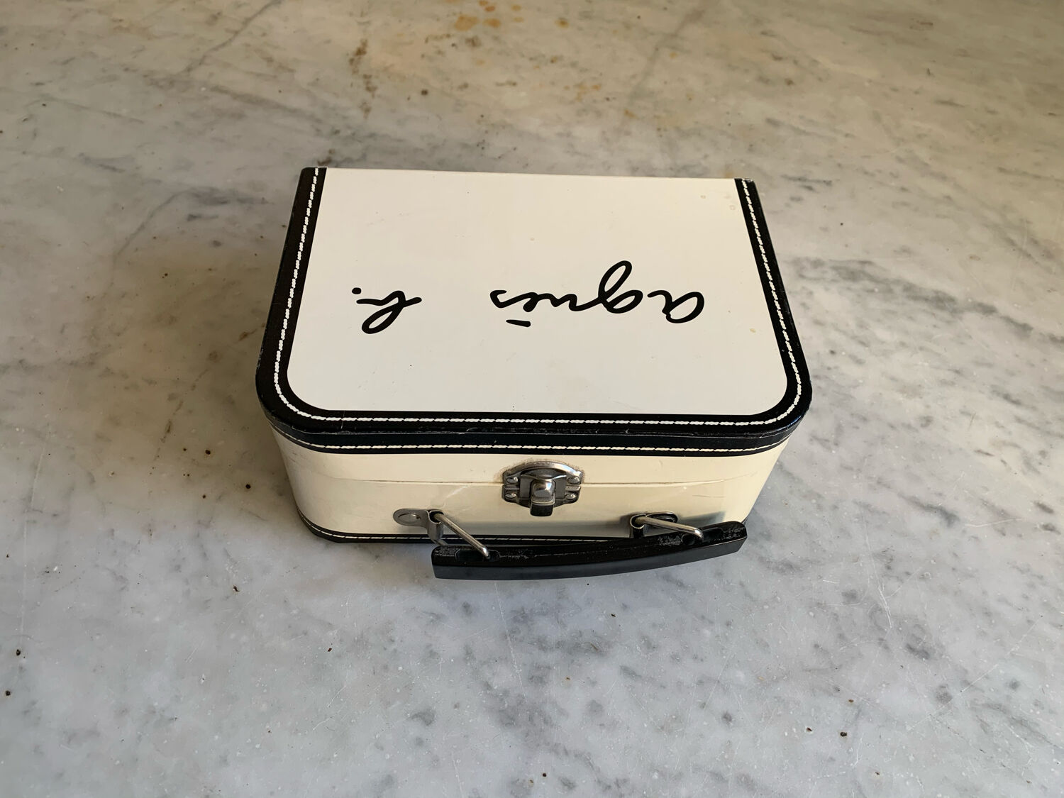 Advertising suitcase Agnès b child