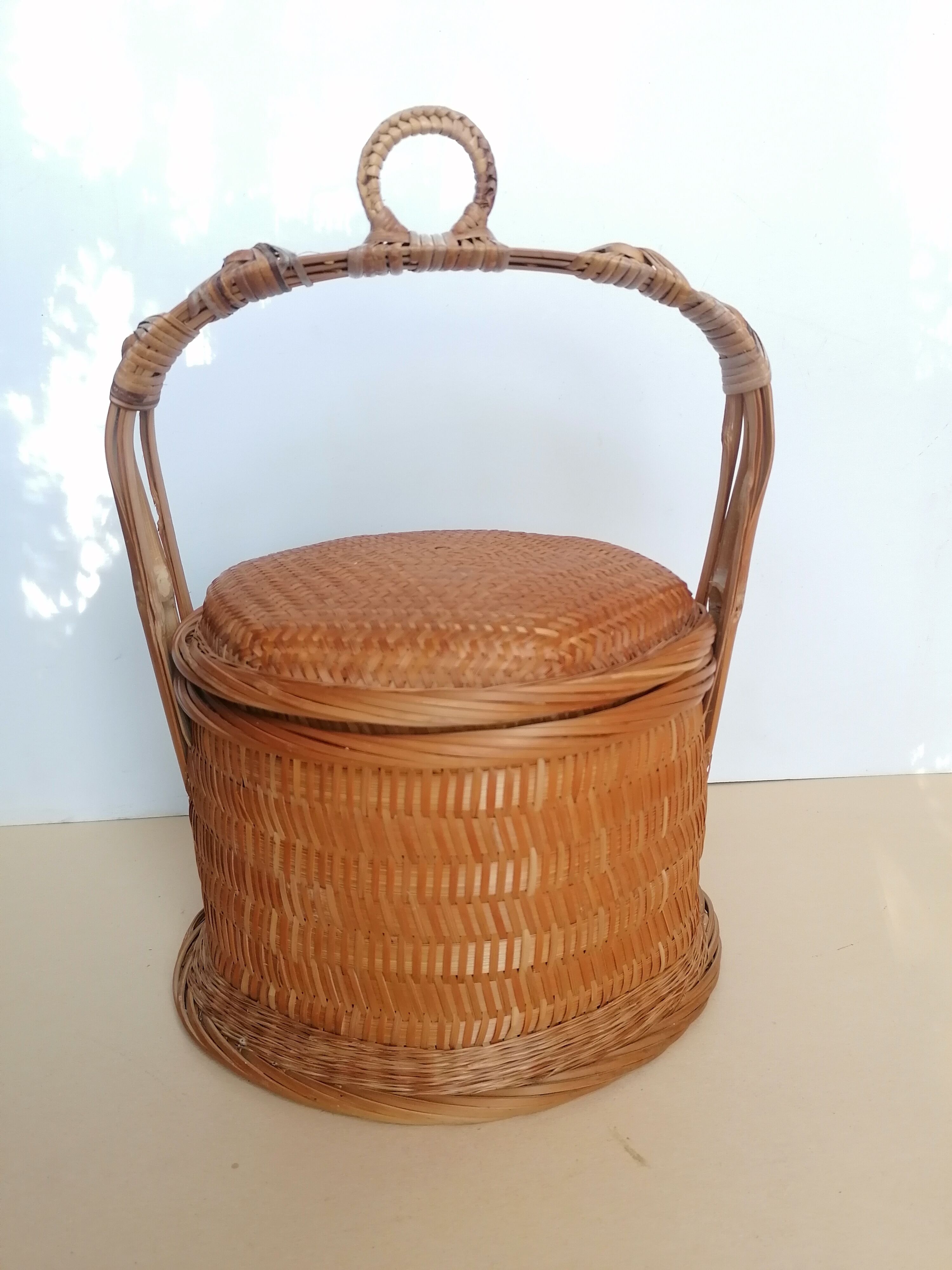 Basket with rattan and bamboo lid