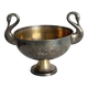 Large champagne bucket with patinated metal swan handles.